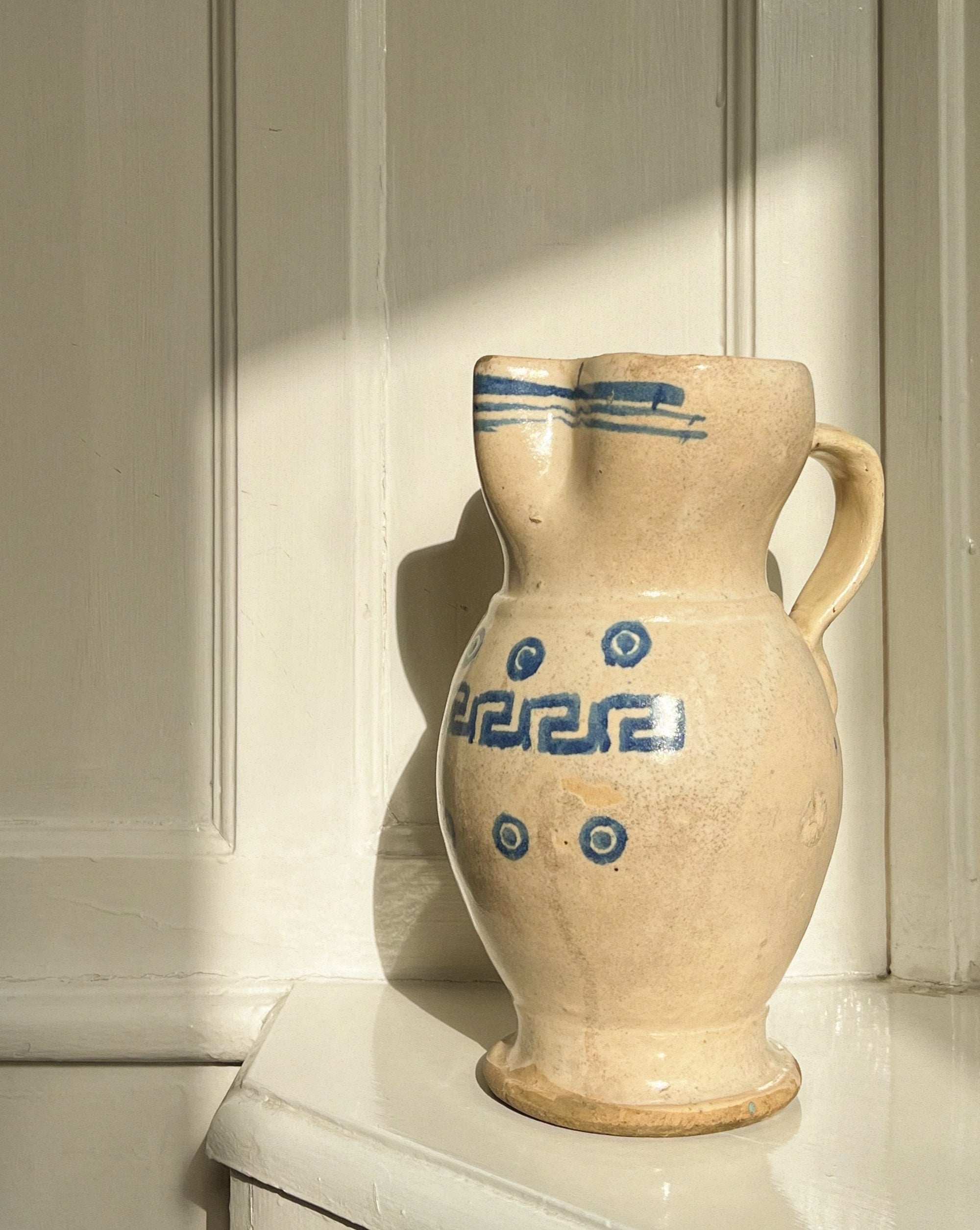 Antique ceramic pitcher meandros