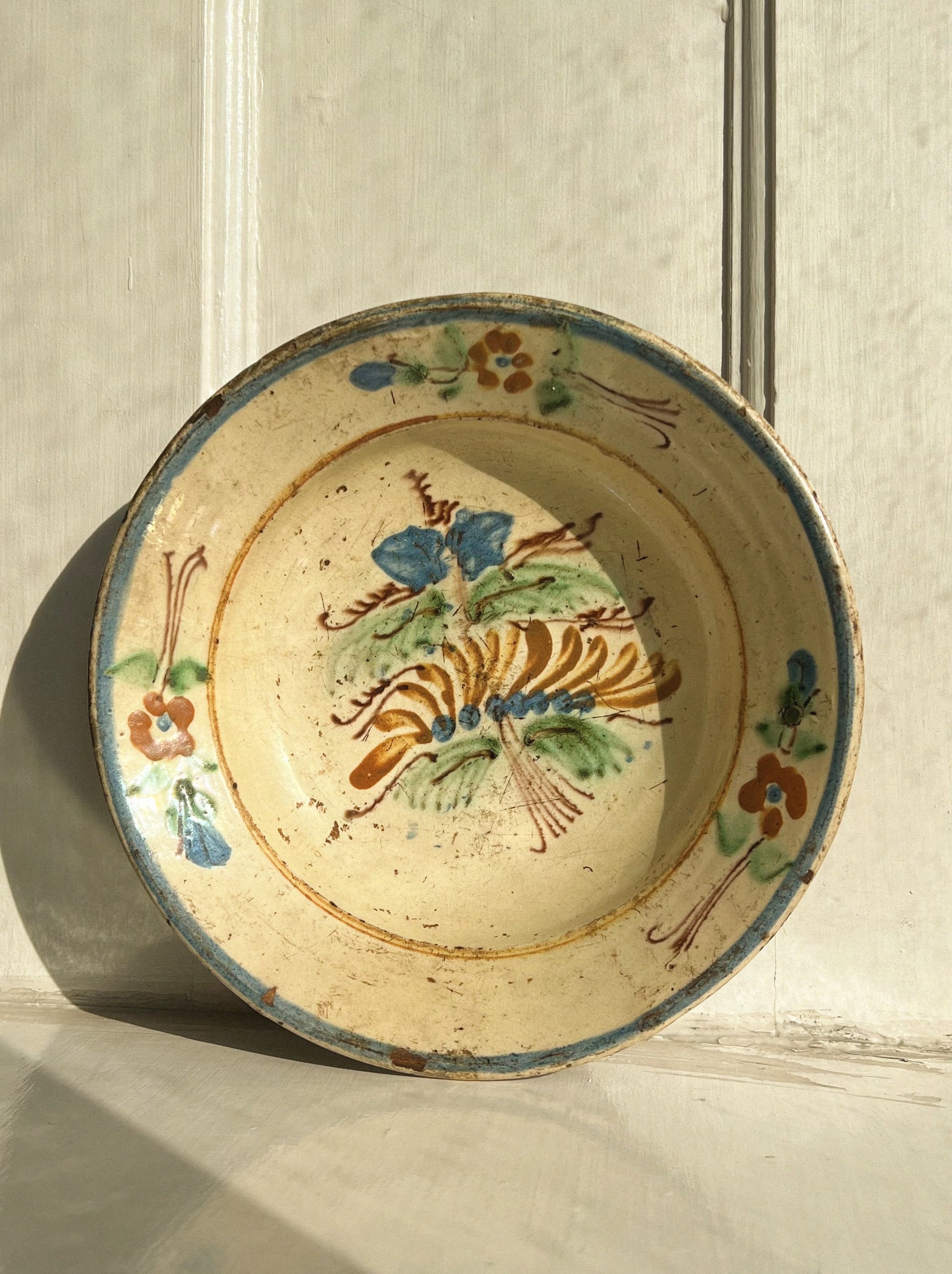 Antique ceramic platter leafy